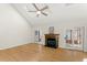 A living room featuring hardwood floors, fireplace and sliding glass doors to the patio at 6008 Chittim Ct, Raleigh, NC 27616