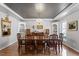 Traditional dining room with wood floors, chandelier, and classic decor at 609 Brookview Dr, Chapel Hill, NC 27514