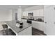 Well-equipped kitchen featuring stainless steel appliances and granite countertops at 73 Club Rd, Louisburg, NC 27549