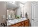 Bright bathroom features double sinks, a large mirror, and a shower at 75 E Moss Creek Dr, Clayton, NC 27520