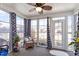 A relaxing sunroom provides great views from inside a comfortable seating area at 75 E Moss Creek Dr, Clayton, NC 27520