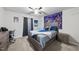 Bedroom with gray walls, a large 