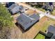 Aerial view of a home with a backyard, featuring a well-maintained lawn at 96 Foxtail Ct, Clayton, NC 27520