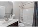 Bathroom with vanity, a framed mirror and a combined shower and tub at 96 Foxtail Ct, Clayton, NC 27520