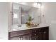 Bathroom features a double vanity with a framed mirror, and decorative accents, providing ample counter space at 96 Foxtail Ct, Clayton, NC 27520