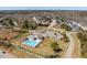 Aerial shot of community pool with parking and lounge, nestled within residences at 96 Foxtail Ct, Clayton, NC 27520