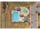 Overhead view of a community pool with lap lanes and kid-friendly zone, surrounded by lounge seating at 96 Foxtail Ct, Clayton, NC 27520