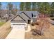Charming two-story home with a well-manicured front yard and attached garage at 96 Foxtail Ct, Clayton, NC 27520