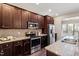 Kitchen featuring granite countertops, stainless appliances, and ample cabinet space at 96 Foxtail Ct, Clayton, NC 27520