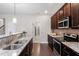 Kitchen featuring stainless appliances, granite countertops and ample cabinets at 96 Foxtail Ct, Clayton, NC 27520