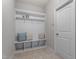 Mudroom with white beadboard offers storage and seating at 96 Foxtail Ct, Clayton, NC 27520
