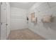 Well-organized walk-in closet with shelving and carpet is ideal for storage at 96 Foxtail Ct, Clayton, NC 27520