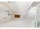 Clean, unfinished basement with white painted walls and a utility sink at 10016 Porto Fino Ave, Wake Forest, NC 27587