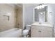 Well-lit bathroom featuring a shower-tub combo with tile surround, and a single sink vanity at 10016 Porto Fino Ave, Wake Forest, NC 27587