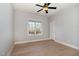 Bedroom with a ceiling fan, a window, and neutral walls at 10016 Porto Fino Ave, Wake Forest, NC 27587