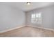 Neutral bedroom with hardwood floors and plantation shutters at 10016 Porto Fino Ave, Wake Forest, NC 27587