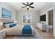 Comfortable bedroom featuring stylish furniture and serene decor with ensuite bathroom at 10016 Porto Fino Ave, Wake Forest, NC 27587