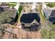 An aerial view of a home's rear exterior and stone patio area at 10016 Porto Fino Ave, Wake Forest, NC 27587
