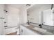 Bathroom features a granite countertop with double sinks and black hardware at 1012 W Webb Ave, Burlington, NC 27217