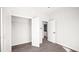 Bedroom with closet and views of kitchen at 1012 W Webb Ave, Burlington, NC 27217