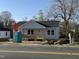 Exterior view of a house under construction with a covered porch and new siding at 1012 W Webb Ave, Burlington, NC 27217
