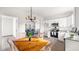 Eat-in kitchen featuring stainless steel appliances and an adjacent dining area at 1012 W Webb Ave, Burlington, NC 27217