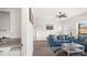Inviting living room with stylish blue sofas and modern flooring at 1012 W Webb Ave, Burlington, NC 27217