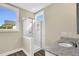 Elegant bathroom featuring a glass-enclosed shower and granite vanity at 1076 Nc 55, Coats, NC 27521