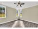 Comfortable bedroom with large windows allowing natural light at 1076 Nc 55, Coats, NC 27521