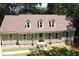 Charming single-Gathering home boasts a welcoming entrance and well-manicured lawn at 1116 Shadywood Ln, Raleigh, NC 27603