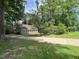 Lovely home nestled among mature trees, offering a peaceful and private setting at 1116 Shadywood Ln, Raleigh, NC 27603