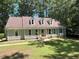 Charming home with well-manicured lawn and a classic facade exuding curb appeal at 1116 Shadywood Ln, Raleigh, NC 27603