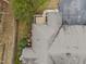 Aerial view showcases the home's roof, patio, landscaping, and driveway at 1146 Blue Bird Ln, Wake Forest, NC 27587