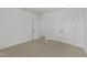 Bedroom with double closets and an open doorway, offering neutral carpet and freshly painted walls at 1146 Blue Bird Ln, Wake Forest, NC 27587