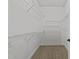 Walk-in closet with shelving, offering plenty of storage space for organization and neatness at 1146 Blue Bird Ln, Wake Forest, NC 27587