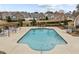 Inviting community pool with comfortable seating and meticulously kept landscaping at 1146 Blue Bird Ln, Wake Forest, NC 27587