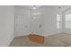 Bright foyer with carpet and tiled entryway at 1146 Blue Bird Ln, Wake Forest, NC 27587