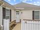 A close-up of the front entrance with a white picket fence at 1146 Blue Bird Ln, Wake Forest, NC 27587