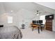 Spacious bedroom with vaulted ceiling, ceiling fan, and carpet at 1206 Linkwood Way, Fuquay Varina, NC 27526