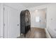 Welcoming entryway featuring an elegant display cabinet and a view of the front door at 1206 Linkwood Way, Fuquay Varina, NC 27526