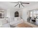 Comfortable living room showcasing views of the adjacent kitchen and dining room featuring modern decor and ample space at 1206 Linkwood Way, Fuquay Varina, NC 27526