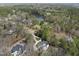 Expansive wooded acreage featuring well-kept real estate at 12101 Lockhart Ln, Raleigh, NC 27614