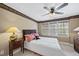 Comfortable bedroom with decorative pillows and natural light at 12101 Lockhart Ln, Raleigh, NC 27614
