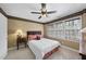Cozy bedroom featuring a ceiling fan and natural light from the double windows at 12101 Lockhart Ln, Raleigh, NC 27614