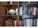 Up close shot of built-in bookshelves with memorabilia and decorations at 12101 Lockhart Ln, Raleigh, NC 27614