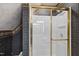Shower with gold door and hardware and patterned wall covering at 12101 Lockhart Ln, Raleigh, NC 27614