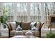 Cozy sitting area with large windows, comfortable seating, and natural light creating a relaxed atmosphere at 12101 Lockhart Ln, Raleigh, NC 27614