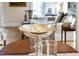 Close-up of elegant table setting with silver bowl, glassware, and decorative linens adds sophistication to dining at 12101 Lockhart Ln, Raleigh, NC 27614