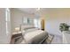 Comfortable bedroom featuring lots of natural light, neutral carpeting, and modern decor at 127 N Keatts Winner Ct, Wilson's Mills, NC 27520
