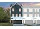 Charming townhome showcases a modern two-story design, complemented by a convenient attached garage at 1411 Chrysalis Pl, Apex, NC 27502